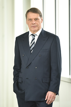 Dr. John Feldmann, Chairman of the Supervisory Board (photo)